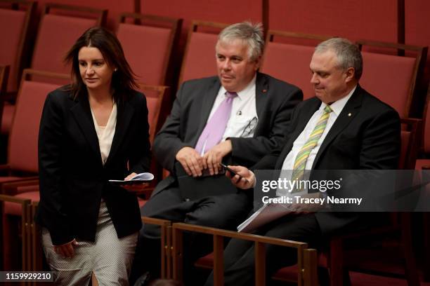 Senator Jacqui Lambie with Senator Stirling Griff and Senator Rex Patrick during a division in the Senate at Parliament House on July 04, 2019 in...