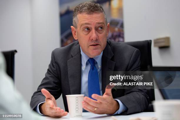 President and CEO of the Federal Reserve Bank of St. Louis James Bullard speaks during an interview with AFP in Washington, DC, on August 6, 2019. -...