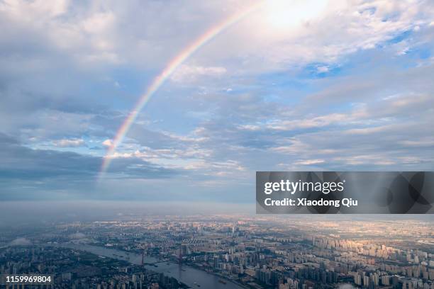 shanghai yangpu bridge under rainbow - rainbow sky stock pictures, royalty-free photos & images