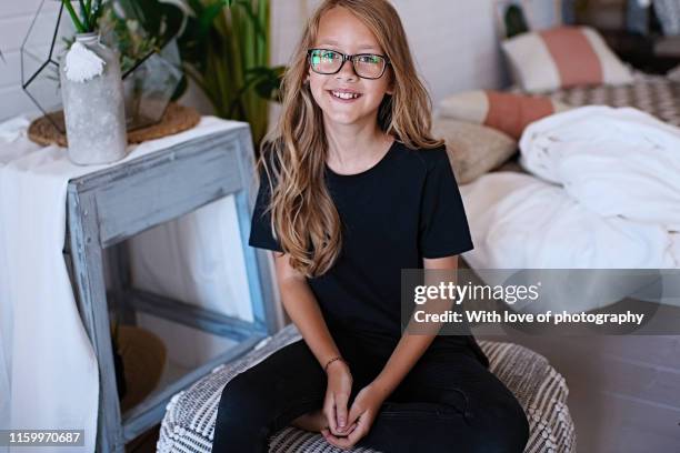 cheerful 9-10 years old girl caucasian wearing glasses with long blonde hair - 8 9 years imagens e fotografias de stock