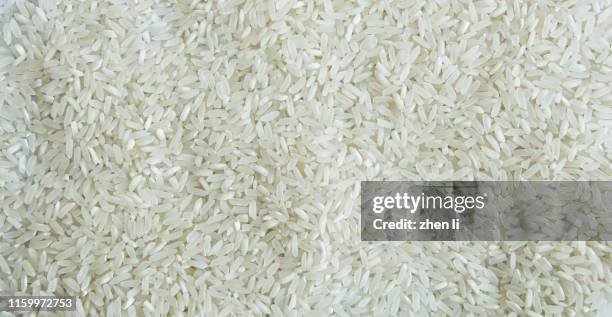 white rice background - white rice stock pictures, royalty-free photos & images