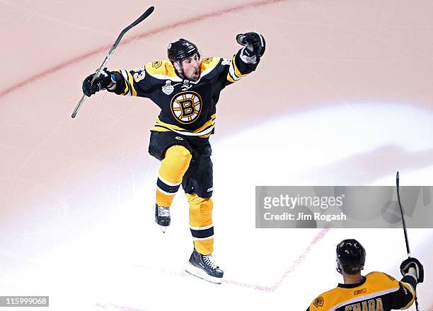 Brad Marchand of the Boston Bruins celebrates after scoring a goal in the first period against Roberto Luongo of the Vancouver Canucks during Game...