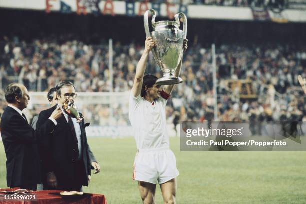 Romanian footballer Stefan Iovan, defender and captain of Steaua Bucuresti, pictured celebrating with the European Cup trophy after Steaua Bucuresti...