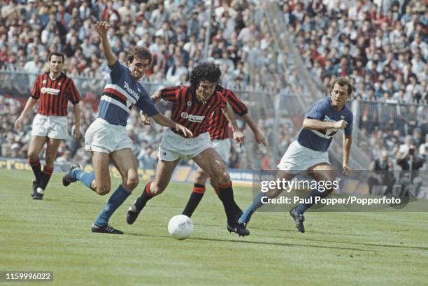 Alessandro Renica, defender with Sampdoria, pictured on left competing for the ball with Sergio Battistini of AC Milan during the Serie A match...