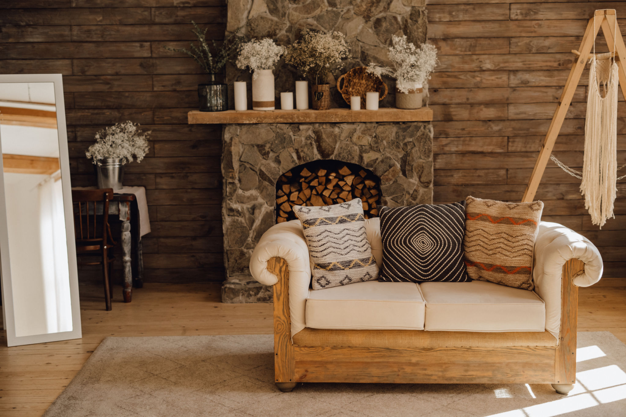 Chalet Cozy Interior Wooden Sofa and Fireplace Chalet Cozy Interior Wooden Sofa and Fireplace