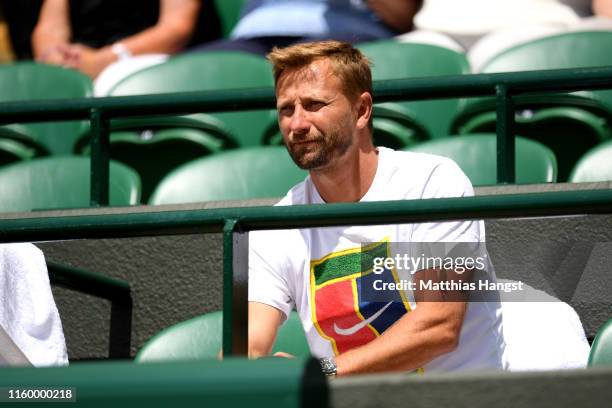 Jiri Vanek, Coach of Petra Kvitova of The Czech Republic watches on ahead of her Ladies' Singles second round match against Kristina Mladenovic of...