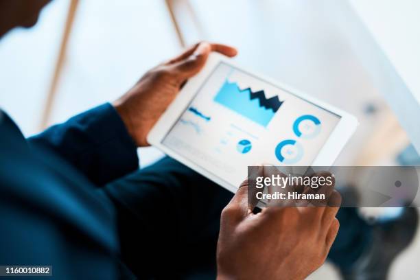 number crunching just got smarter - business strategy stock pictures, royalty-free photos & images