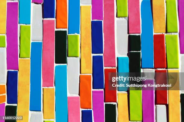 colorful ceramic wall in thai temple. abstract mosaic porcelain ceramic tile background. colored rectangles. - terracotta tile stock pictures, royalty-free photos & images