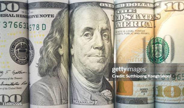 rolls dollar banknotes. dollar currency money. banknotes stacked on each other in different positions - 100 fotografías e imágenes de stock