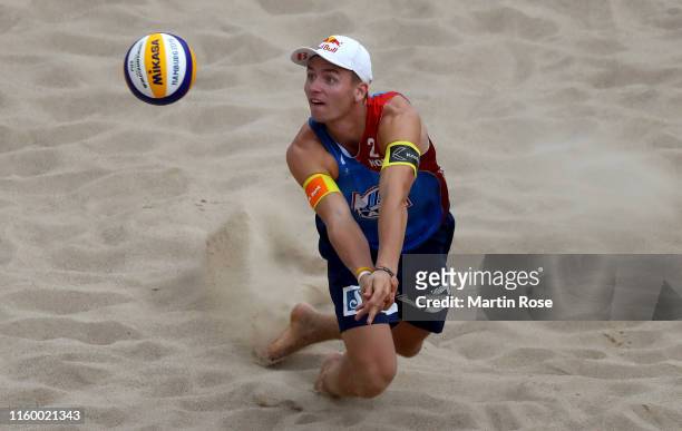 Christian Sorum of Norway in action during the match against Philipp Bergmann and Yannick Harms of Germany on day seven of the FIVB Beach Volleyball...