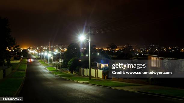 australian suburbs at night - australia street stockfoto's en -beelden