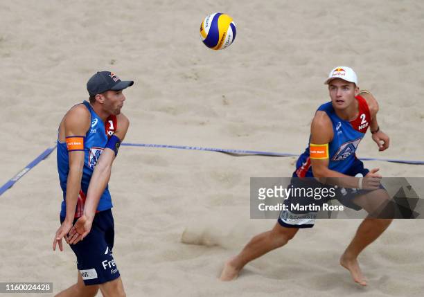 Anders Mol of Norway and Christian Sorum in action during the match against Philipp Bergmann and Yannick Harms of Germany on day seven of the FIVB...