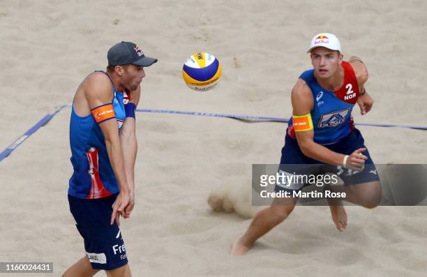 Anders Mol of Norway and Christian Sorum in action during the match against Philipp Bergmann and Yannick Harms of Germany on day seven of the FIVB...