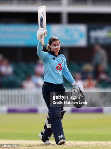 Tammy Beaumont of England celebrates her century during the 2nd Royal London Women's ODI match between England and Australia at Fischer County Ground...