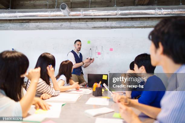 businessman giving presentation - japan training session stock pictures, royalty-free photos & images