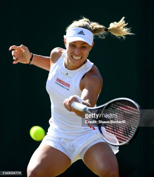 Angelique Kerber of Germany plays a forehand in her Ladies' Singles second round match against Lauren Davis of The United States during Day four of...
