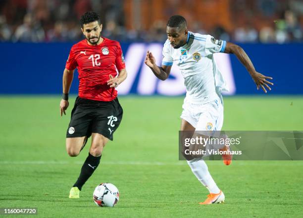 Ayman Ashram of Egypt and Cedric Bakambu of DR Congo during the 2019 Africa Cup of Nations Group A match between Egypt and DR Congo at Cairo...