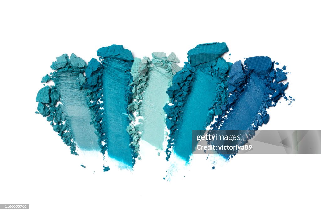 Brush stroke of crushed bright blue and turquoise eye shadow