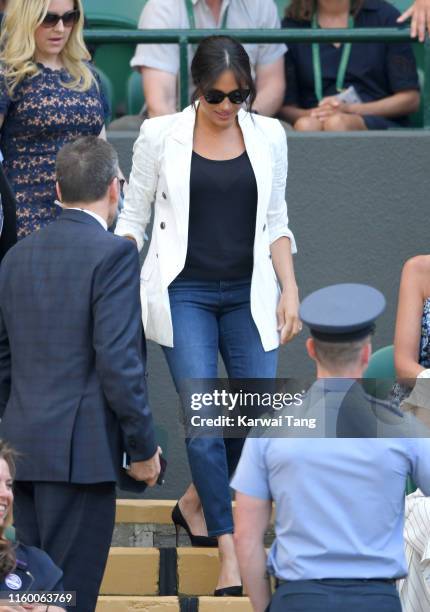 Meghan, Duchess of Sussex attends day four of the Wimbledon Tennis Championships at All England Lawn Tennis and Croquet Club on July 04, 2019 in...