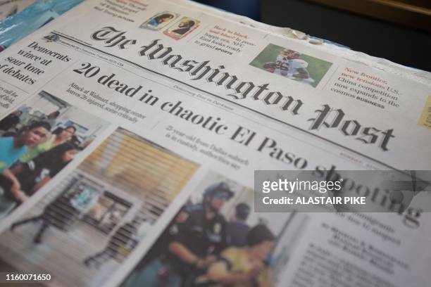 The front page of The Washington Post newspaper is seen at a convenience store in Washington, DC, on August 6, 2019.