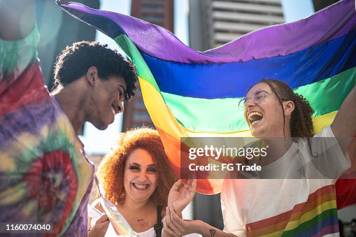 Group of friends enjoying the LGBTQI parade Group of friends enjoying the LGBTQI parade