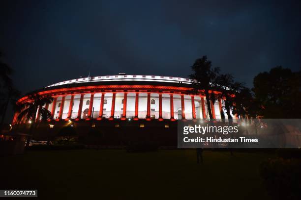 Parliament building illuminated as the 73rd Independence Day approaches, on August 6, 2019 in New Delhi, India. The The Lok Sabha on Tuesday vetted...