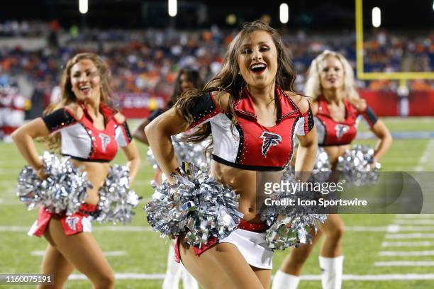 The Atlanta Falcons cheerleaders perform during the Hall of Fame Game between the Atlanta Falcons and the Denver Broncos played at Tom Benson Hall of...