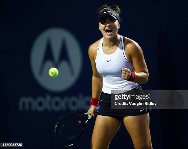 Bianca Andreescu of Canada celebrates a point against Eugenie Bouchard of Canada during in a first round match on Day 4 of the Rogers Cup at Aviva...