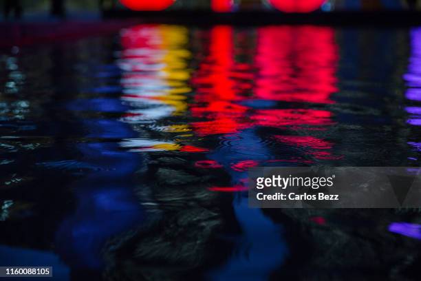city lights reflextion - broadway street stock pictures, royalty-free photos & images