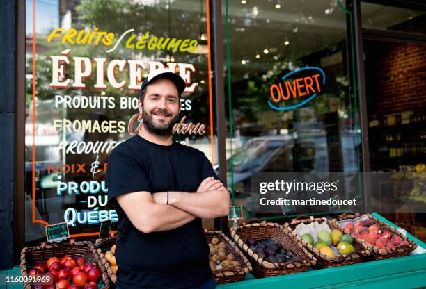 owner of small zero waste oriented grocery store. - quebec canada stock pictures, royalty-free photos & images