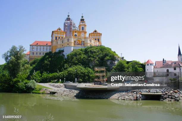 panorama of the famous st. peter and paul church in melk benedictine abbey, wachau valley, lower austria - abbey of montserrat stockfoto's en -beelden