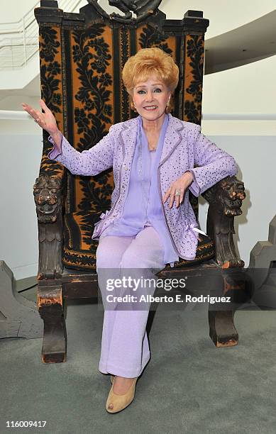 Actress Debbie Reynolds shows her Hollywood memorabilia on display at the Paley Center for Media on June 13, 2011 in Beverly Hills, California.