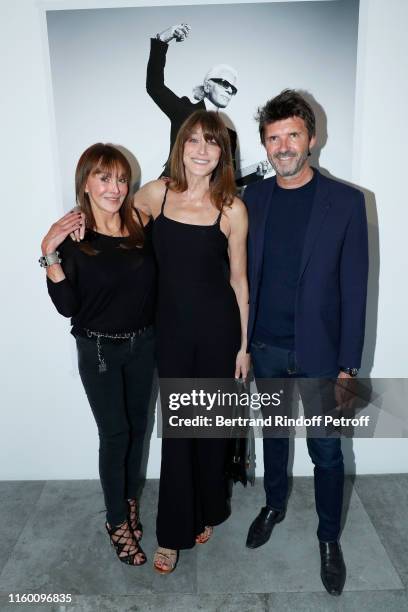 Creator of the 'Numero magazine' Babeth Djian, Carla Bruni-Sarkozy and CEO of Mazarine Group Paul-Emmanuel Reiffers attend the "Mondino Numero 20...