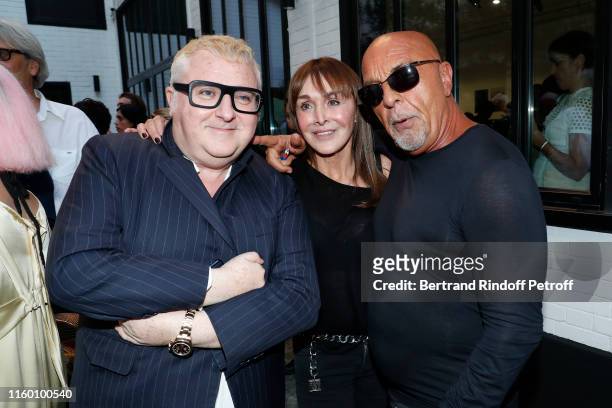 Designer Alber Elbaz, Creator of the 'Numero magazine' Babeth Djian and Jean-Baptiste Mondino attend the "Mondino Numero 20 ans" by photographer...
