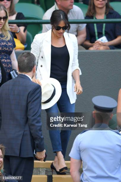 Meghan, Duchess of Sussex attends day four of the Wimbledon Tennis Championships at All England Lawn Tennis and Croquet Club on July 04, 2019 in...