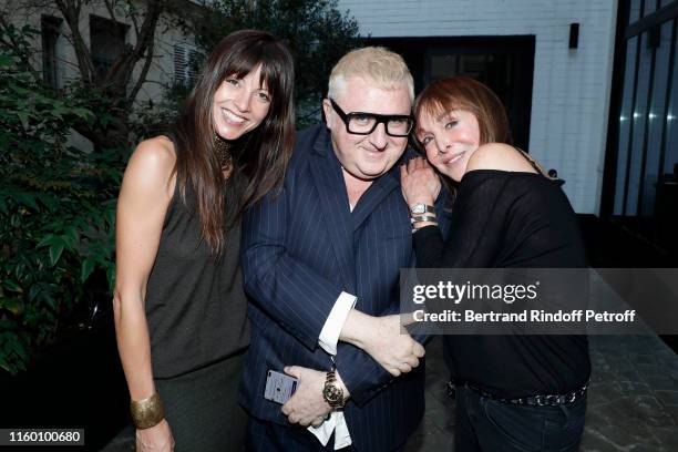 Caroline Nielsen, Designer Alber Elbaz and Creator of the 'Numero magazine' Babeth Djian attend the "Mondino Numero 20 ans" by photographer...