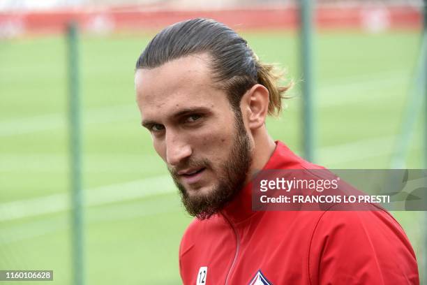 New Losc midfielder Yusuf Yazici looks on as he takes part in a training on August 7 at the training center of the Domaine de Luchin in Camphin en...