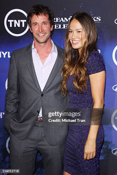 Noah Wyle and Moon Bloodgood arrive at the Los Angeles Premiere of "Falling Skies" at SilverScreen Theater at the Pacific Design Center on June 13,...