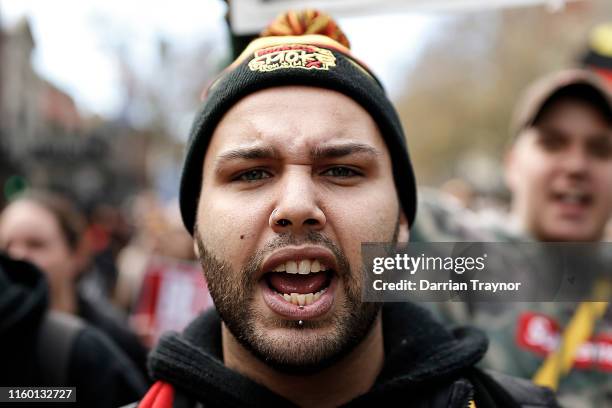 Man takes part in the annual NAIDOC march on July 05, 2019 in Melbourne, Australia. The march marks the start of NAIDOC Week, which runs in the first...