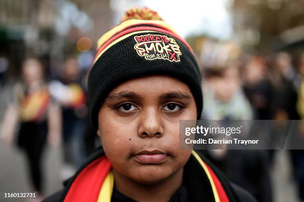 Boy takes part in the annual NAIDOC march on July 05, 2019 in Melbourne, Australia. The march marks the start of NAIDOC Week, which runs in the first...