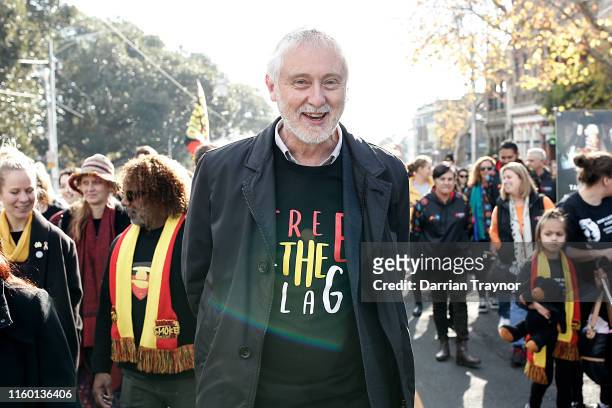 The Hon. Gavin Jennings, member of the Victorian Labor Party takes part in the NAIDOC march wearing a 'Free the Flag' t-shirt. Debate has begun...