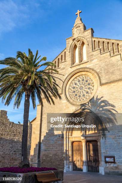 facade of church of alcudia - alcudia stockfoto's en -beelden