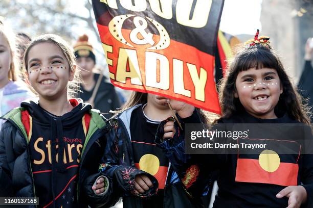 Young girls take part in the annual NAIDOC march on July 05, 2019 in Melbourne, Australia. The march marks the start of NAIDOC Week, which runs in...