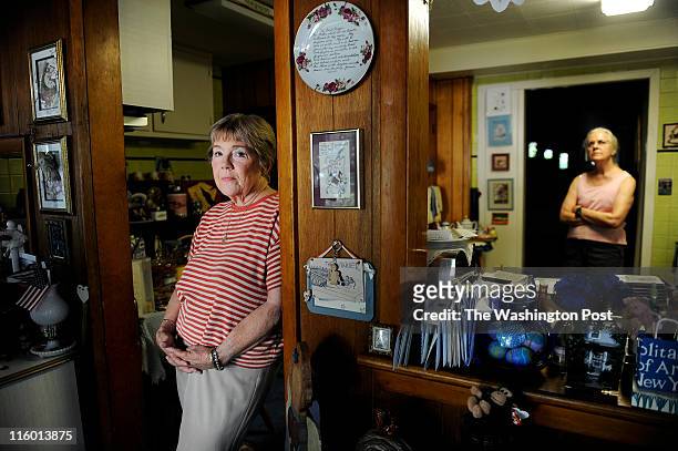 Hillwood Square residents, Tabitha Yothers and Patricia Hickerson stand in the kitchen of Yothers home on June 08, 2011 in Falls Church, VA. The...
