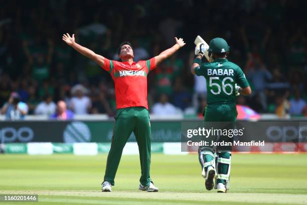 Mohammad Saifuddin of Bangladesh celebrates after taking the wicket of Babar Azam of Pakistan during the Group Stage match of the ICC Cricket World...