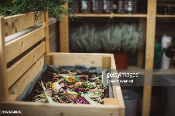 making compost from leftovers - compost stock pictures, royalty-free photos & images
