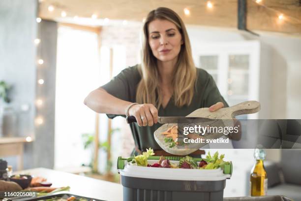 making compost from vegetable leftovers - compost stock pictures, royalty-free photos & images