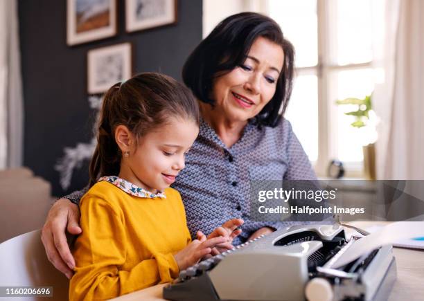 Girl Using Typewriter Girl Typewriter Photos and Premium High Res Pictures - Getty Images