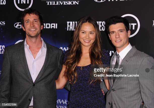 Noah Wyle, Moon Bloodgood and Drew Roy arrive at the premiere of TNT's "Falling Skies" held at Pacific Design Center on June 13, 2011 in West...