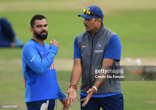 India captain Virat Kohli chats with coach Ravi Shastri during India nets ahead of their Cricket World Cup Match against Sri Lanka at Headingley on...